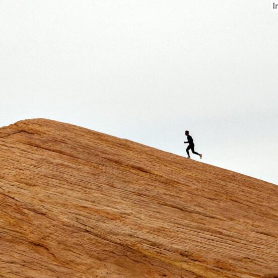 Man running up a hill